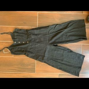 Black linen jumpsuit with smocked back